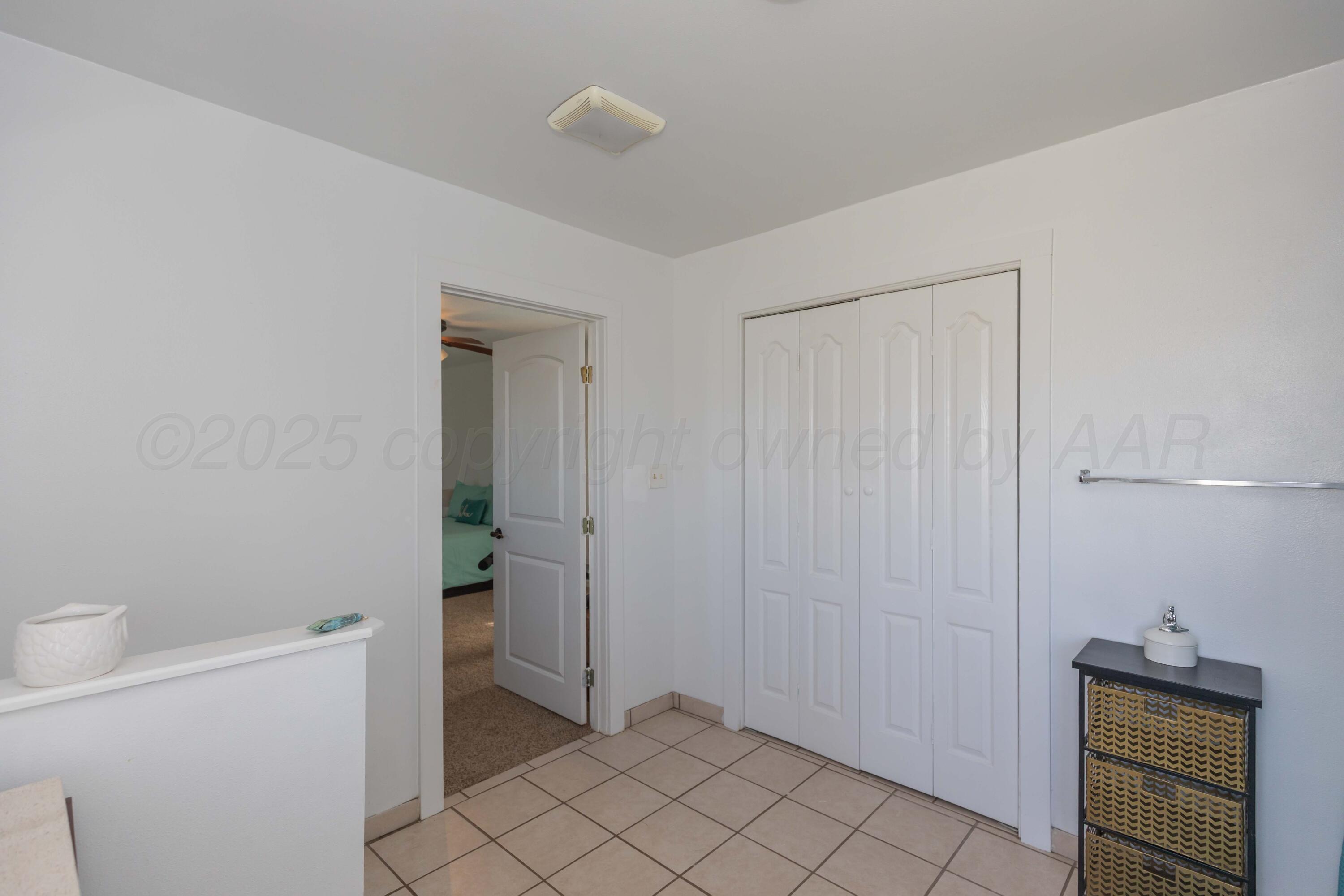 105 Poplar Street Skellytown, TX 79080 - Photo 22 of 37 a bathroom with a toilet