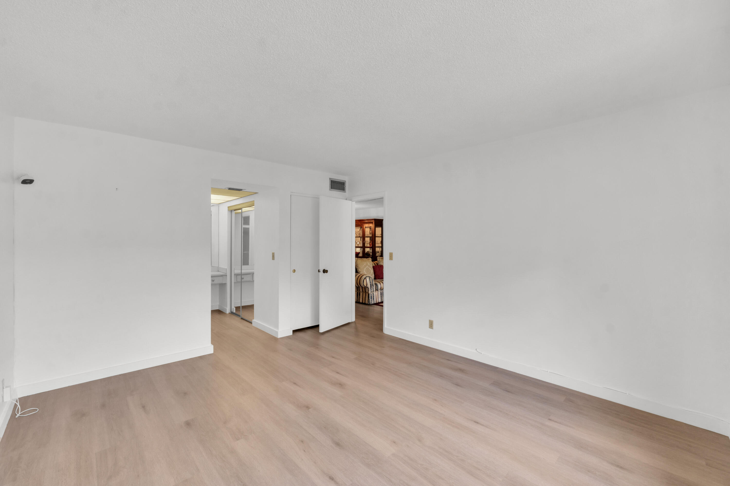 301 Cambridge Road, Unit 202 Hollywood, FL 33024 - Photo 18 of 38 Primary Bedroom