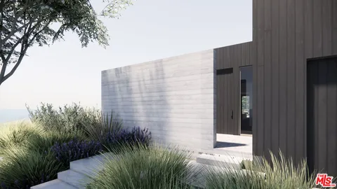 an aerial view of residential house with outdoor space