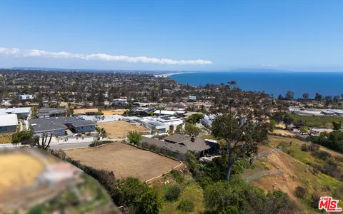 a view of a yard with an outdoor space