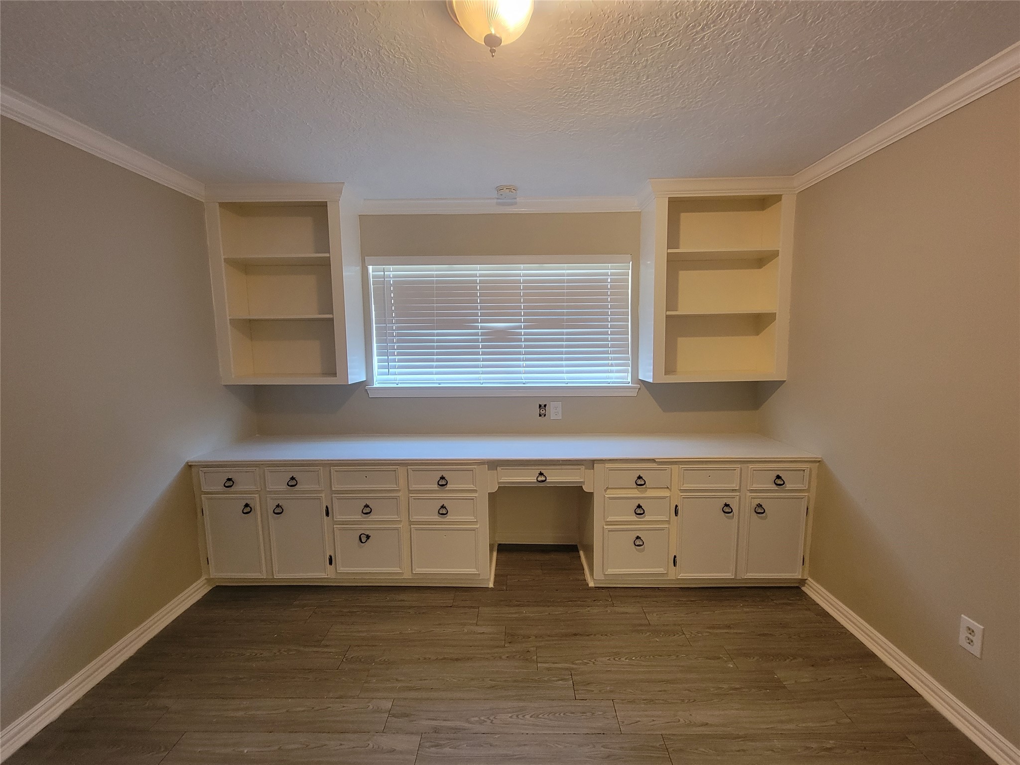 4015 Chapel Square Drive Spring, TX 77388 - Photo 23 of 27 This built-in shelving and cabinetry create an ideal office workspace.