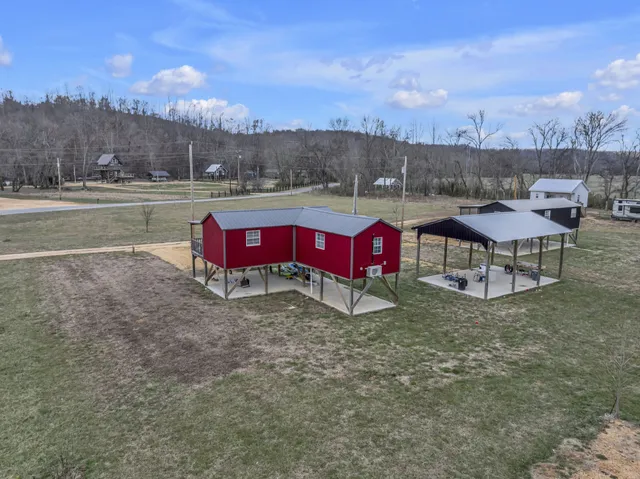 a view of a yard with furniture and a yard