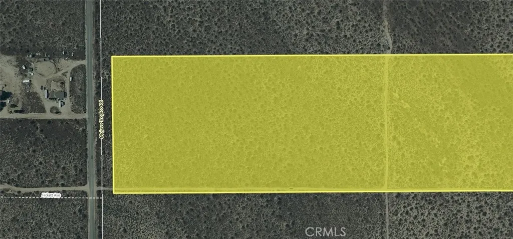 a view of a swimming pool with an outdoor space and seating area