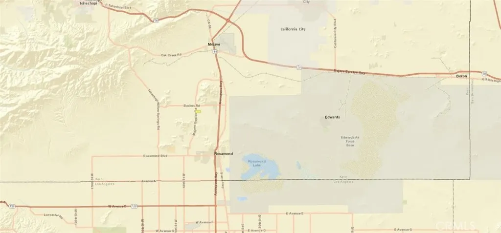 12 Mojave-Tropico Road Mojave, CA 93501 - Photo 12 of 13 a bathroom with a glass shower door