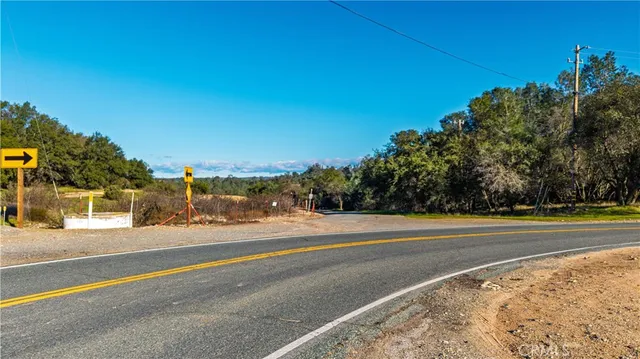 a view of a swimming pool and a yard