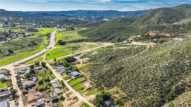 a view of an aerial view of residential houses with outdoor space