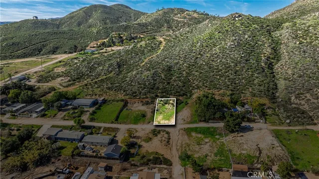 an aerial view of residential house with outdoor space