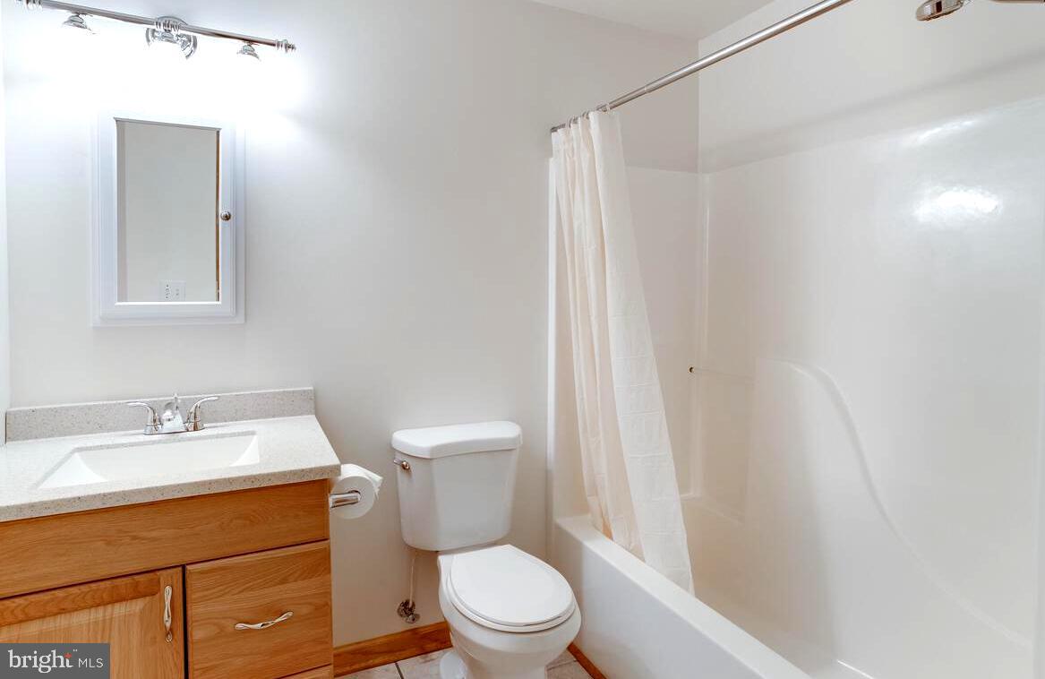 8429 Bussenius Road Pasadena, MD 21122 - Photo 11 of 46 Renovated Lower Level Full Bath