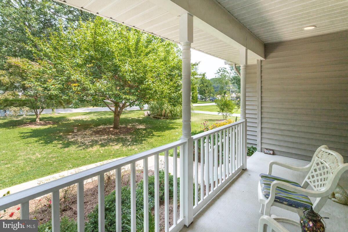 8429 Bussenius Road Pasadena, MD 21122 - Photo 15 of 46 Welcoming Plantation Porch for Morning Coffee!