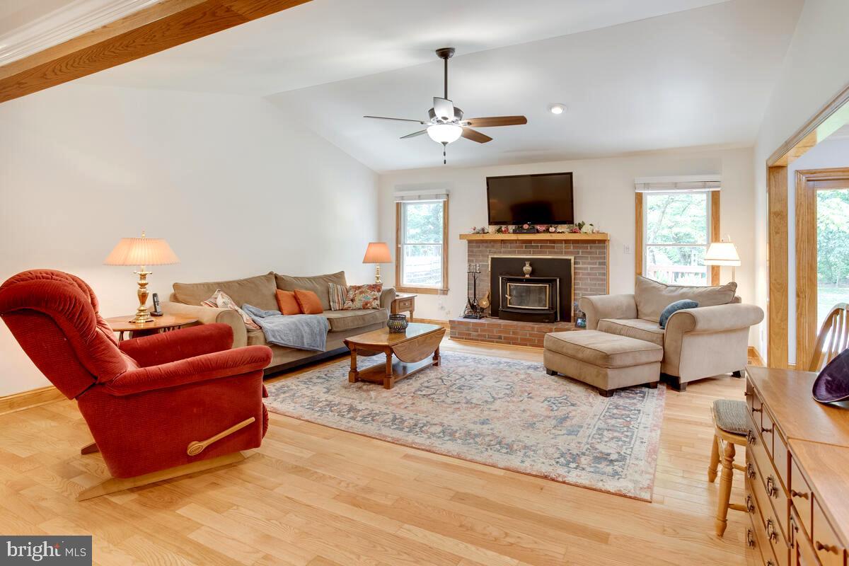 8429 Bussenius Road Pasadena, MD 21122 - Photo 18 of 46 Vaulted Living Room . Oversized Andersen Windows