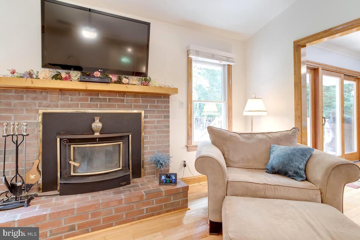 8429 Bussenius Road Pasadena, MD 21122 - Photo 19 of 46 Brick Wood Burning Stove for Family Gatherings