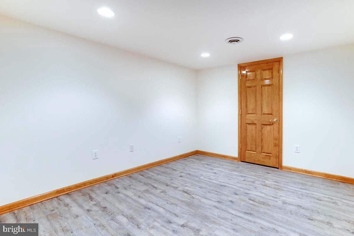 8429 Bussenius Road Pasadena, MD 21122 - Photo 39 of 46 Basement Bedroom . Recessed Lighting Throughout