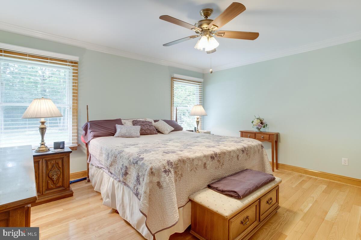 8429 Bussenius Road Pasadena, MD 21122 - Photo 7 of 46 Generous Primary Bedroom Suite with Bath