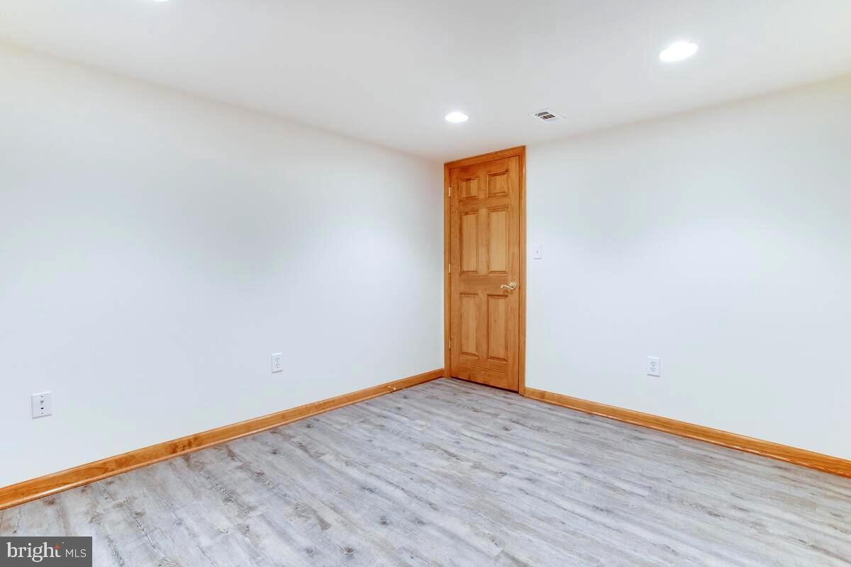 8429 Bussenius Road Pasadena, MD 21122 - Photo 10 of 46 Lower Level Bedroom . Possible In-Law Quarters!