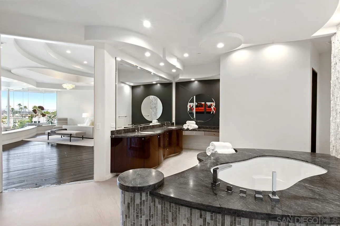 7447 Hillside Drive La Jolla, CA 92037 - Photo 21 of 55 a kitchen with a table and chairs