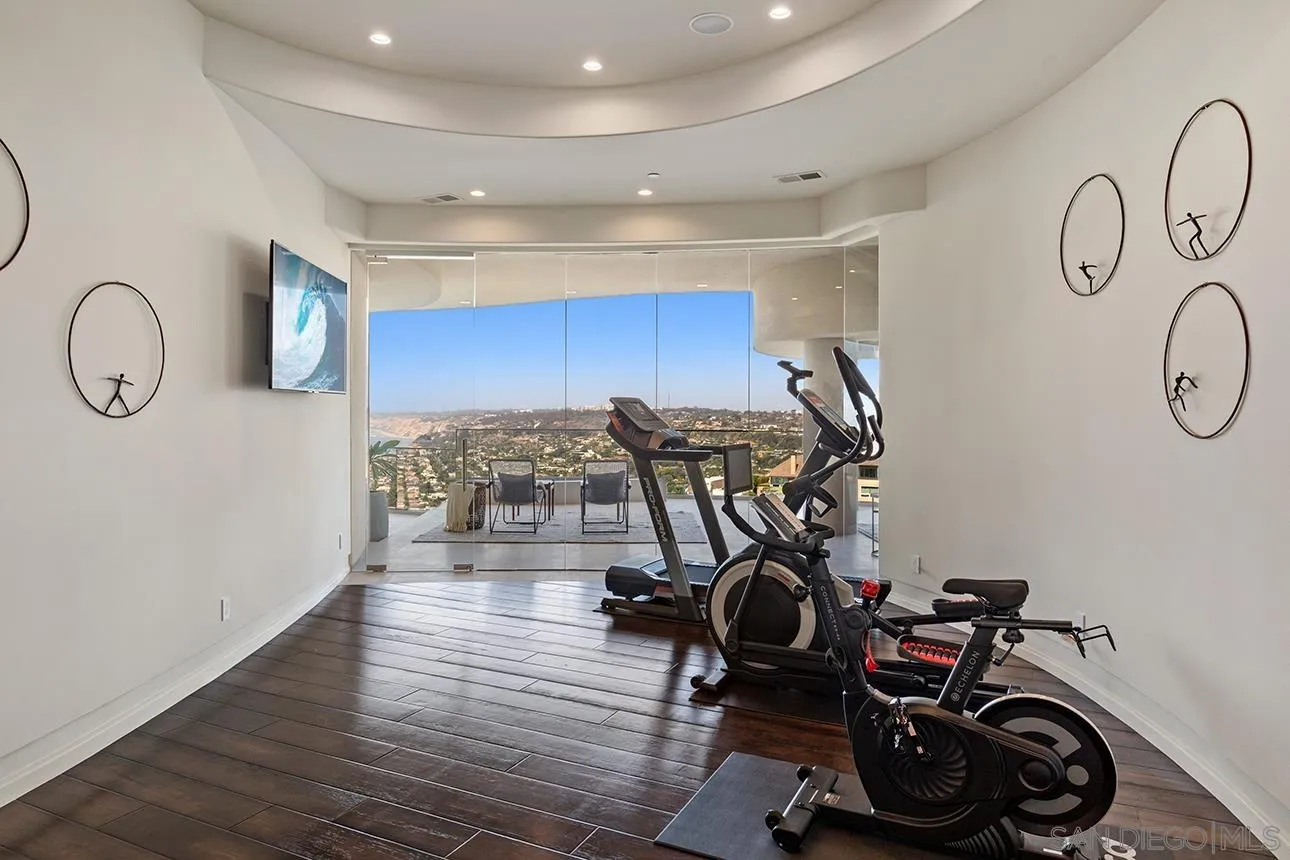 7447 Hillside Drive La Jolla, CA 92037 - Photo 29 of 55 a view of a room with gym equipment