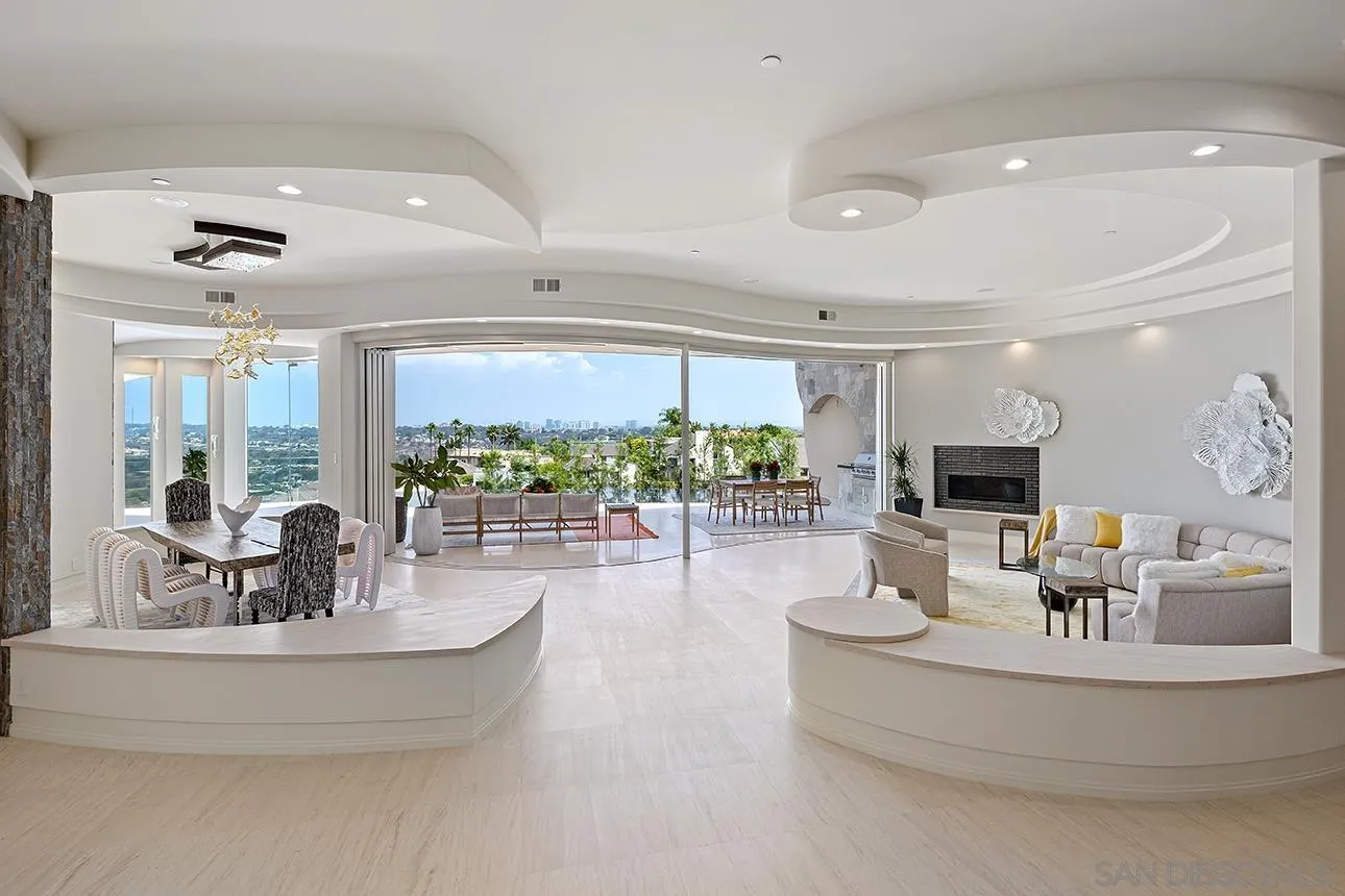 7447 Hillside Drive La Jolla, CA 92037 - Photo 32 of 55 a living room with furniture and a large window