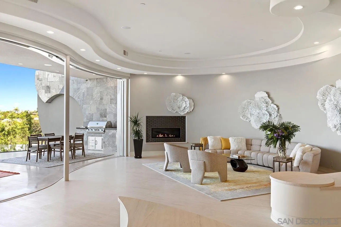 7447 Hillside Drive La Jolla, CA 92037 - Photo 36 of 55 a living room with furniture and a fireplace