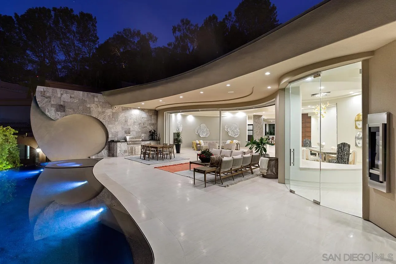 7447 Hillside Drive La Jolla, CA 92037 - Photo 4 of 55 a living room with furniture and a large window