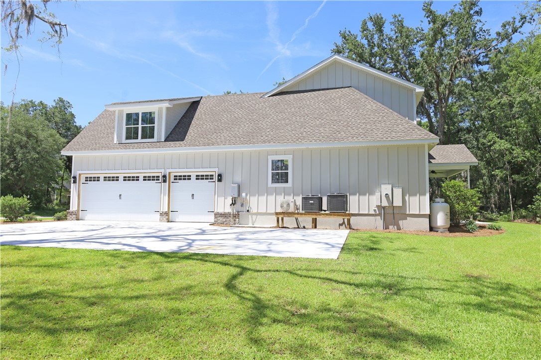 133 Badram Trail Brunswick, GA 31523 - Photo 7 of 35 Side w/ Garage