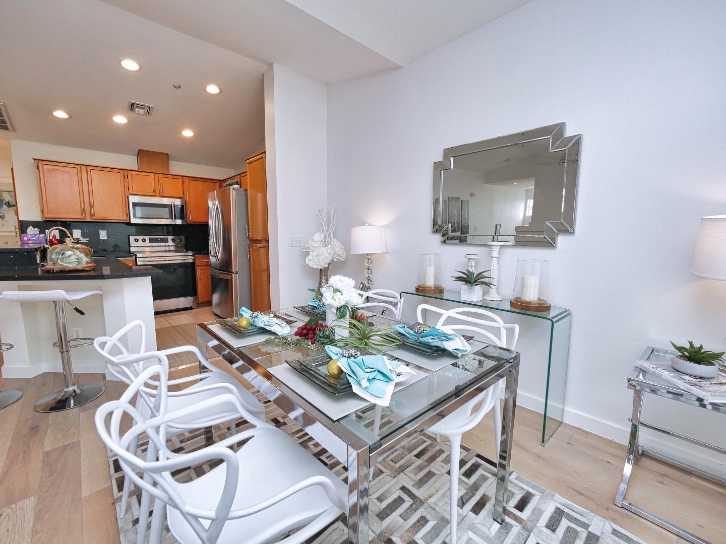 1302 Dawn Court San Ramon, CA 94583 - Photo 40 of 100 a living room with furniture a flat screen tv and kitchen view