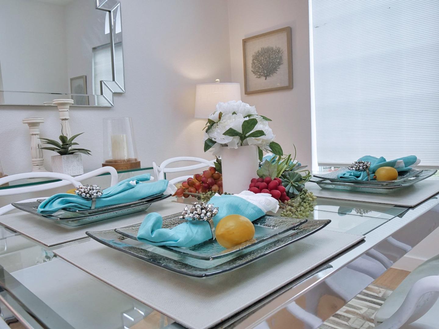 1302 Dawn Court San Ramon, CA 94583 - Photo 46 of 100 a table with a vase and flowers on it