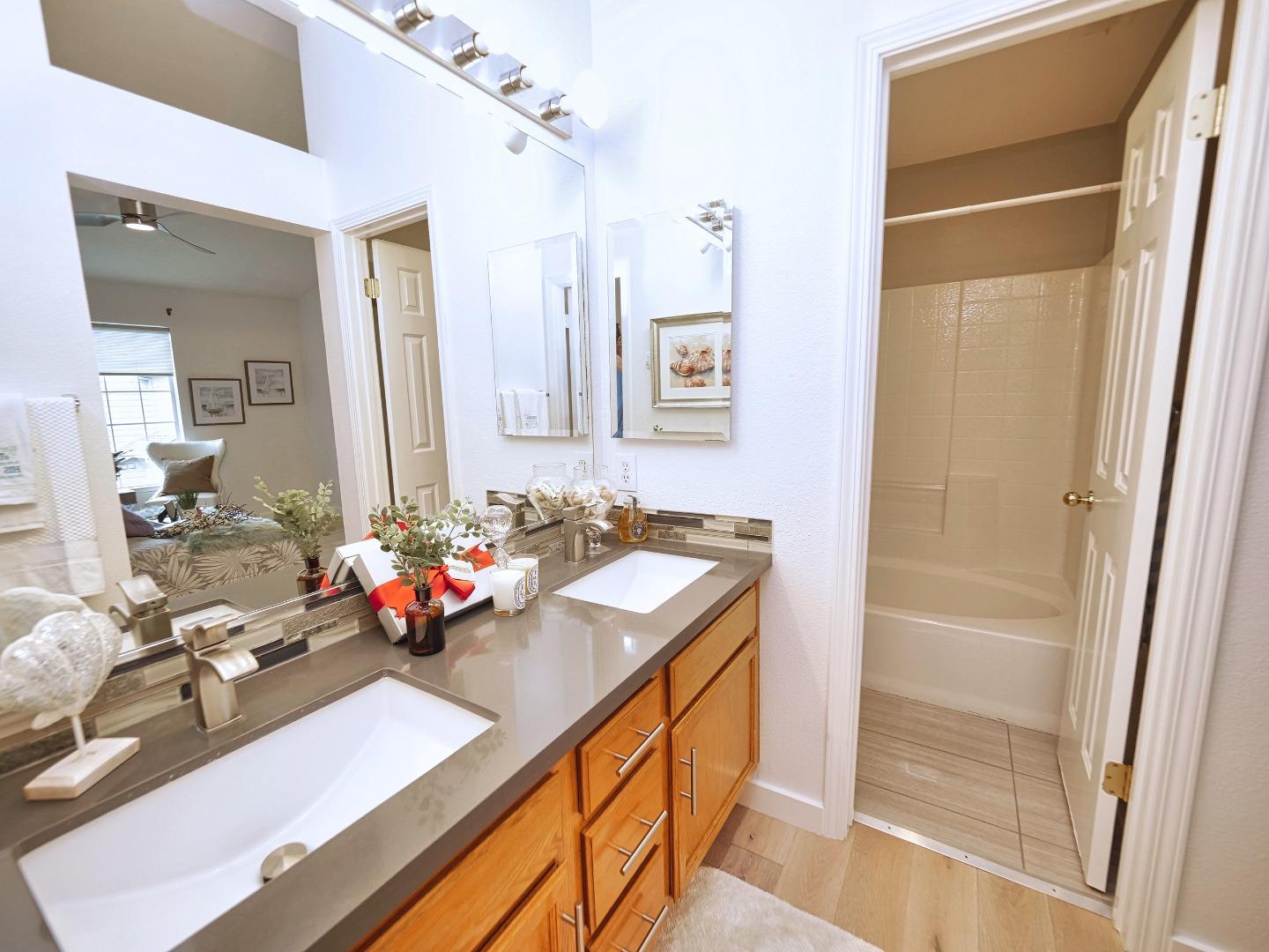 1302 Dawn Court San Ramon, CA 94583 - Photo 73 of 100 a bathroom with a sink vanity granite and a mirror