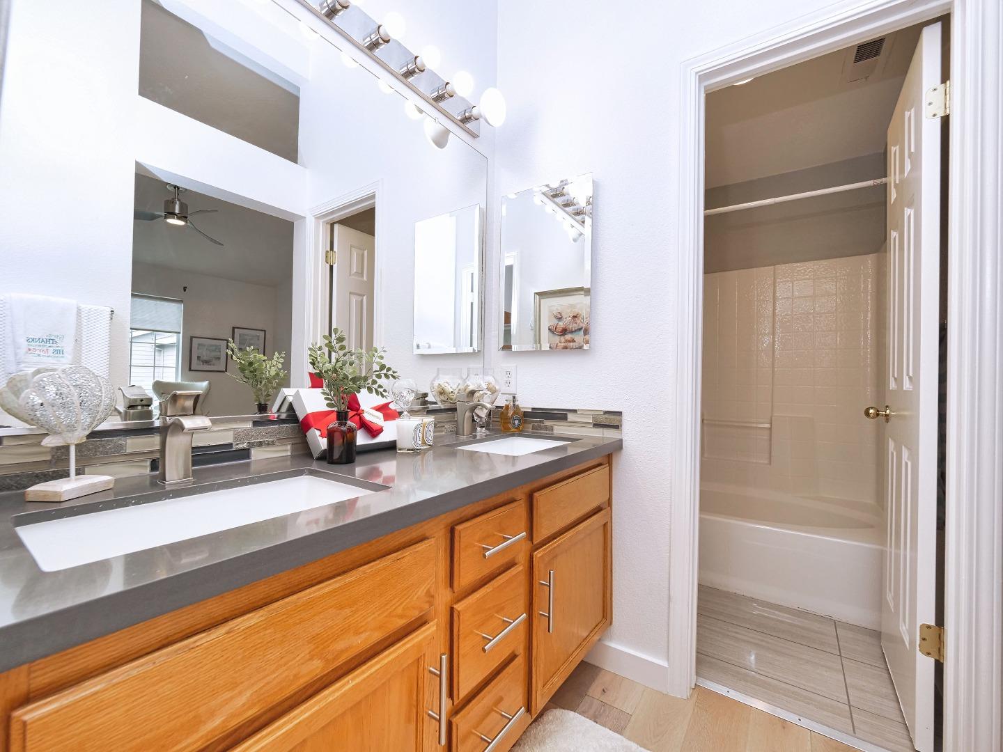 1302 Dawn Court San Ramon, CA 94583 - Photo 75 of 100 a bathroom with a sink double vanity and a mirror