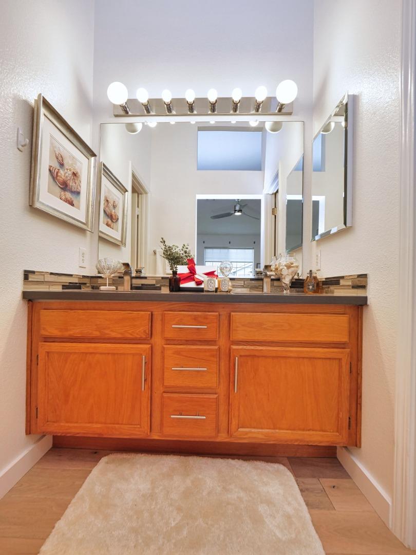 1302 Dawn Court San Ramon, CA 94583 - Photo 77 of 100 a bathroom with a sink and a mirror