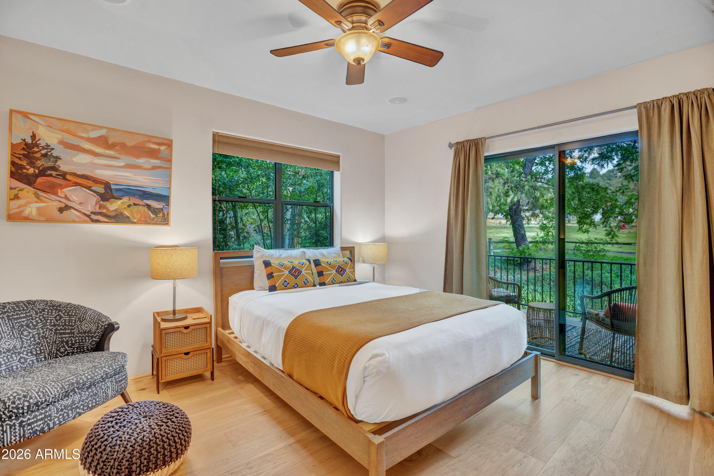 55 Ranch House Circle Sedona, AZ 86336 - Photo 22 of 61 a bedroom with a bed and a large window