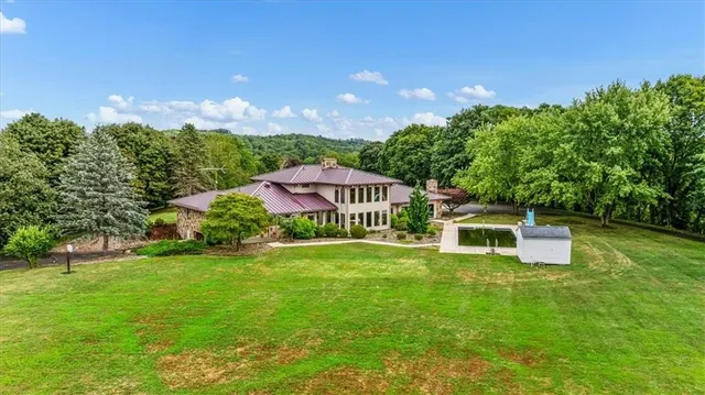 a view of a house with a big yard