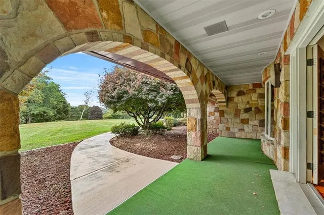a view of a porch with a yard