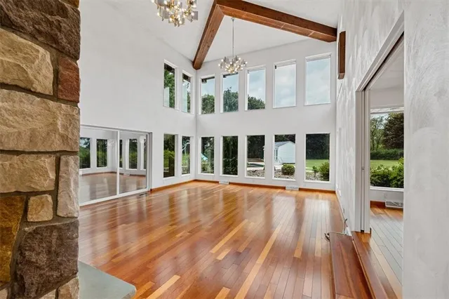 a view of pool with brick walls