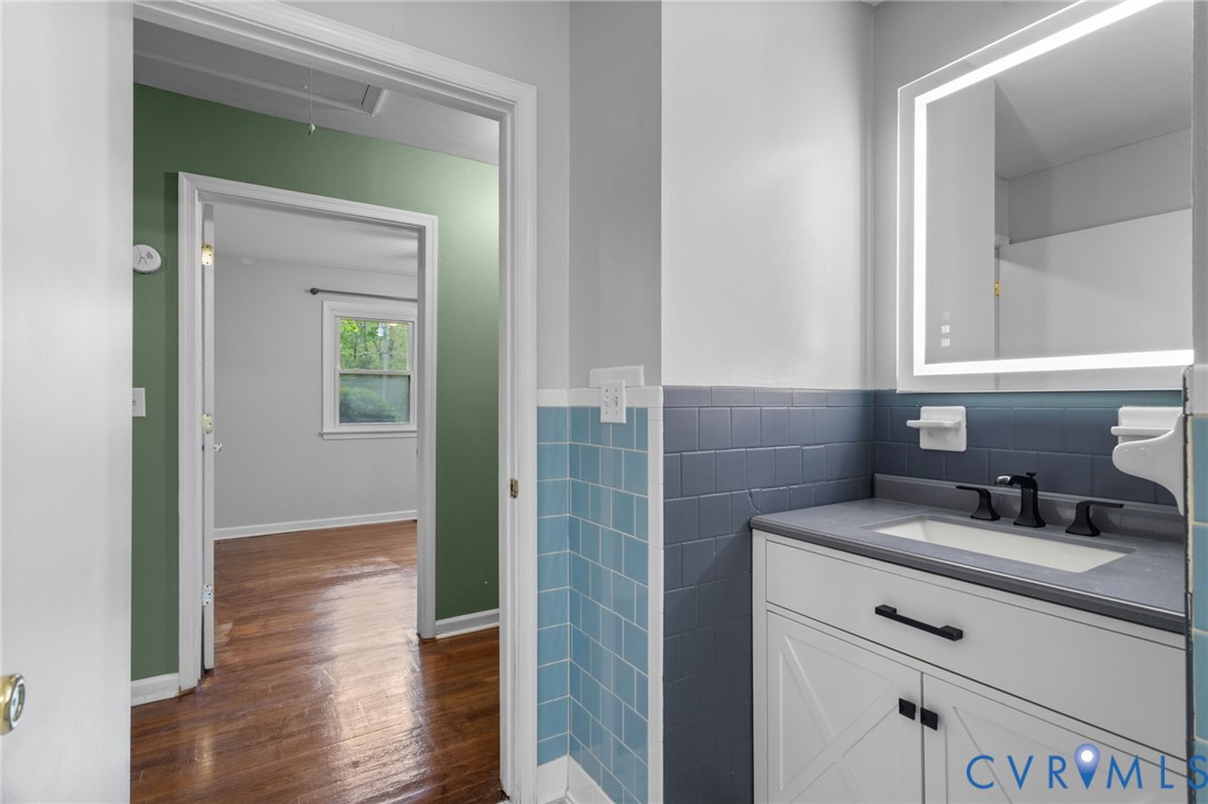 8141 Military Road Amelia Court House, VA 23002 - Photo 20 of 40 a bathroom with a sink and a mirror