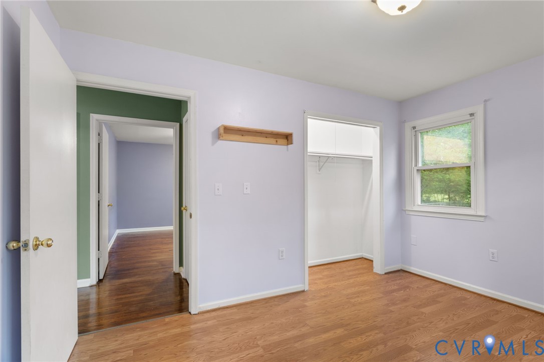 8141 Military Road Amelia Court House, VA 23002 - Photo 25 of 40 an empty room with windows and closet