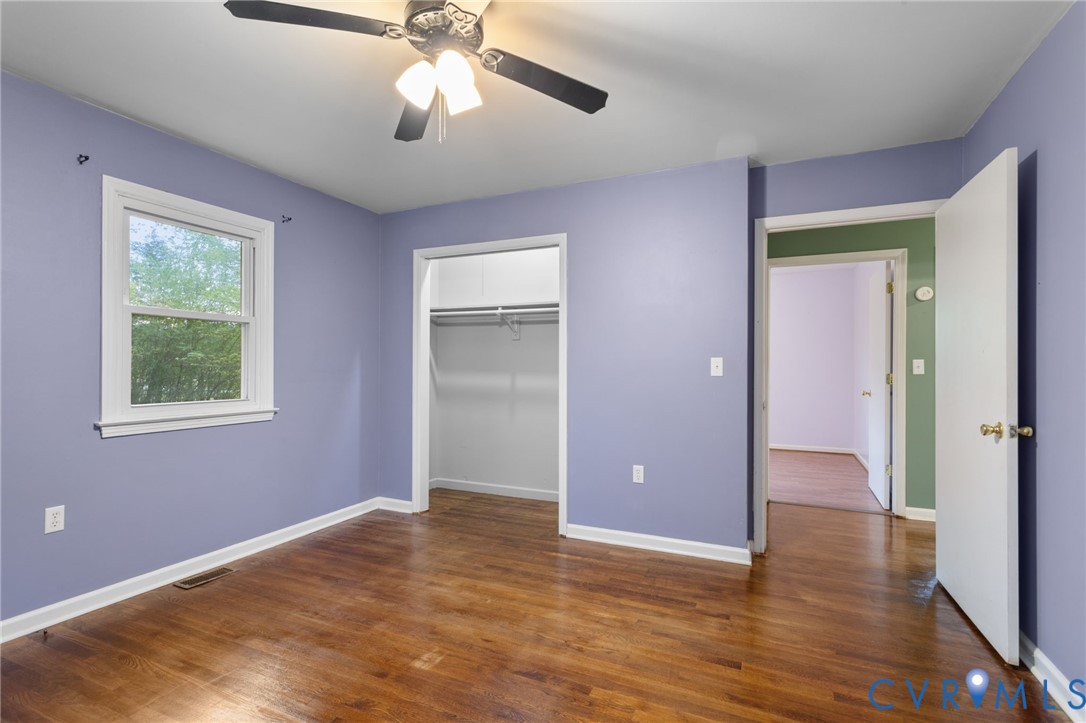 8141 Military Road Amelia Court House, VA 23002 - Photo 27 of 40 a view of an empty room with window and wooden floor
