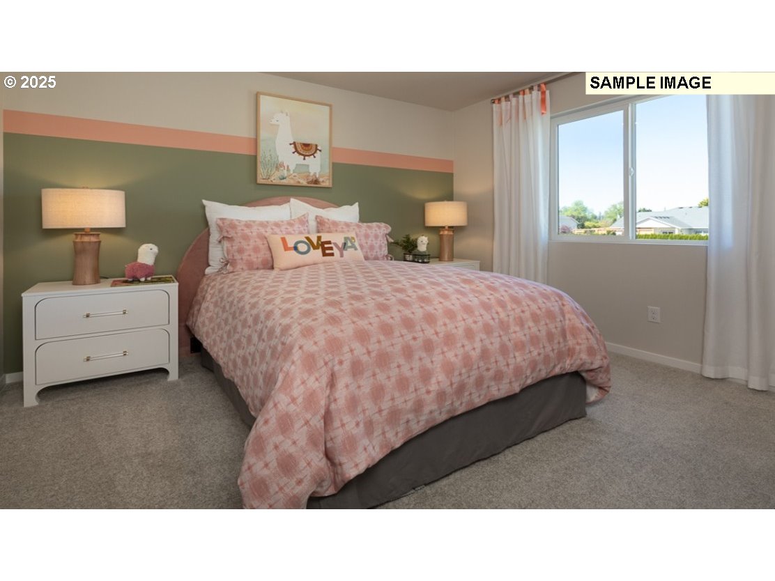 3115 Southwest 4th Avenue Battle Ground, WA 98604 - Photo 11 of 20 a bed room with a bed and a night stand