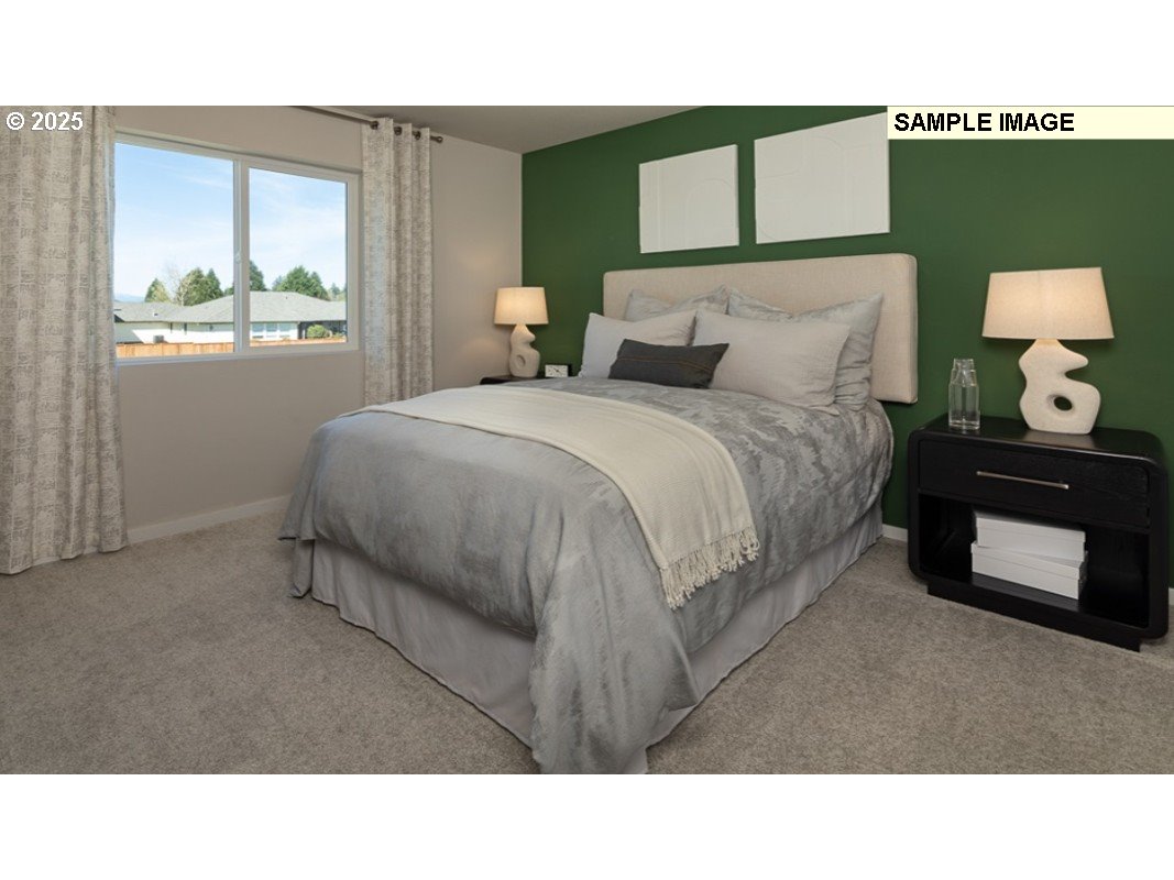 3115 Southwest 4th Avenue Battle Ground, WA 98604 - Photo 12 of 20 a bedroom with a bed and a window