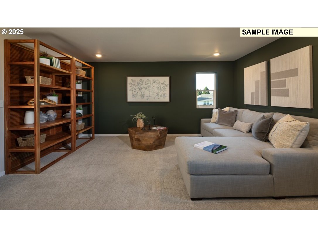 3115 Southwest 4th Avenue Battle Ground, WA 98604 - Photo 13 of 20 a living room with furniture and a book shelf