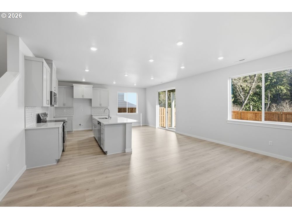3115 Southwest 4th Avenue Battle Ground, WA 98604 - Photo 19 of 20 a view of kitchen with wooden floors and kitchen