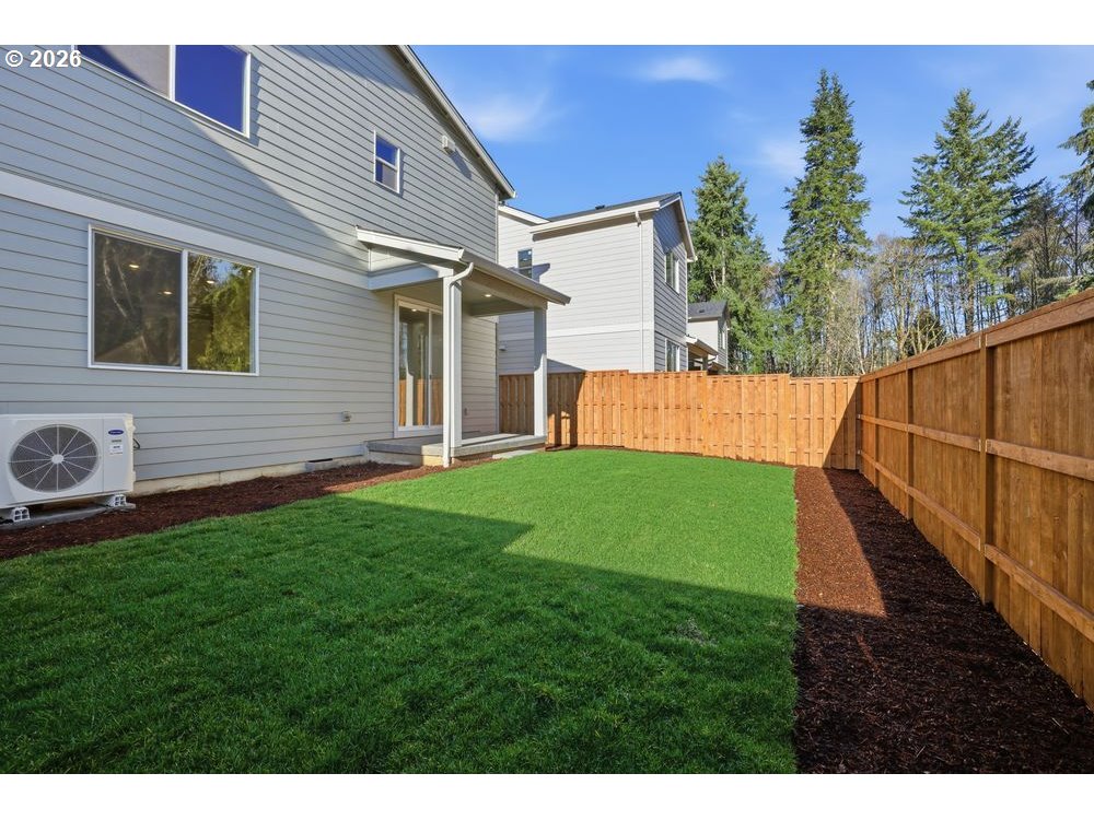 3115 Southwest 4th Avenue Battle Ground, WA 98604 - Photo 20 of 20 a view of a house with a yard