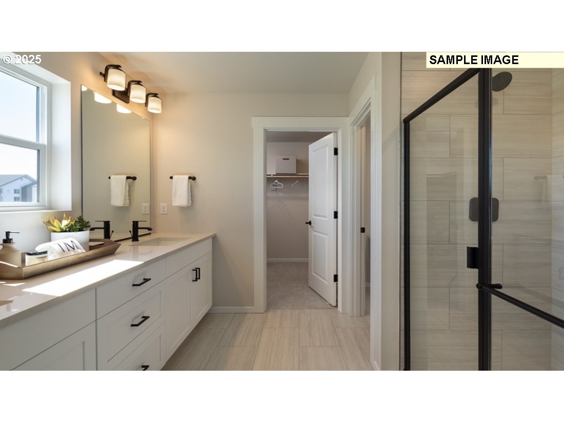 3115 Southwest 4th Avenue Battle Ground, WA 98604 - Photo 5 of 20 a bathroom with a sink double vanity and a mirror