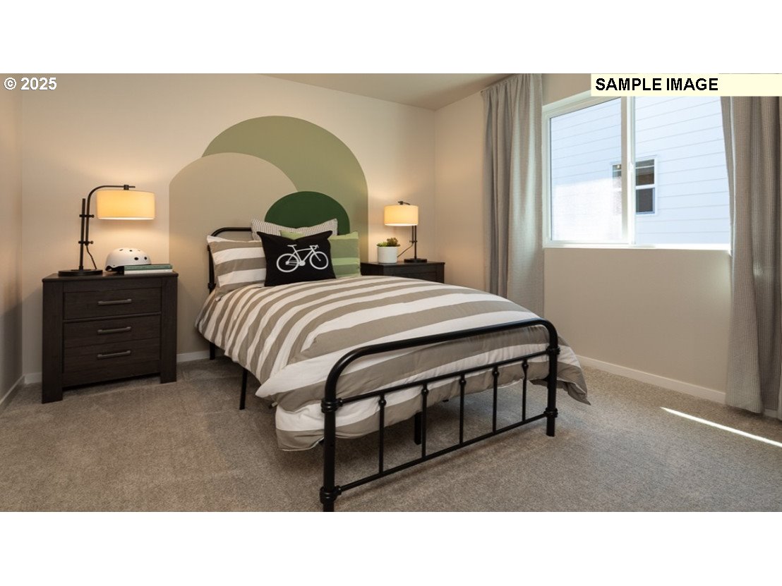 3115 Southwest 4th Avenue Battle Ground, WA 98604 - Photo 10 of 20 a living room with a bed furniture and a window
