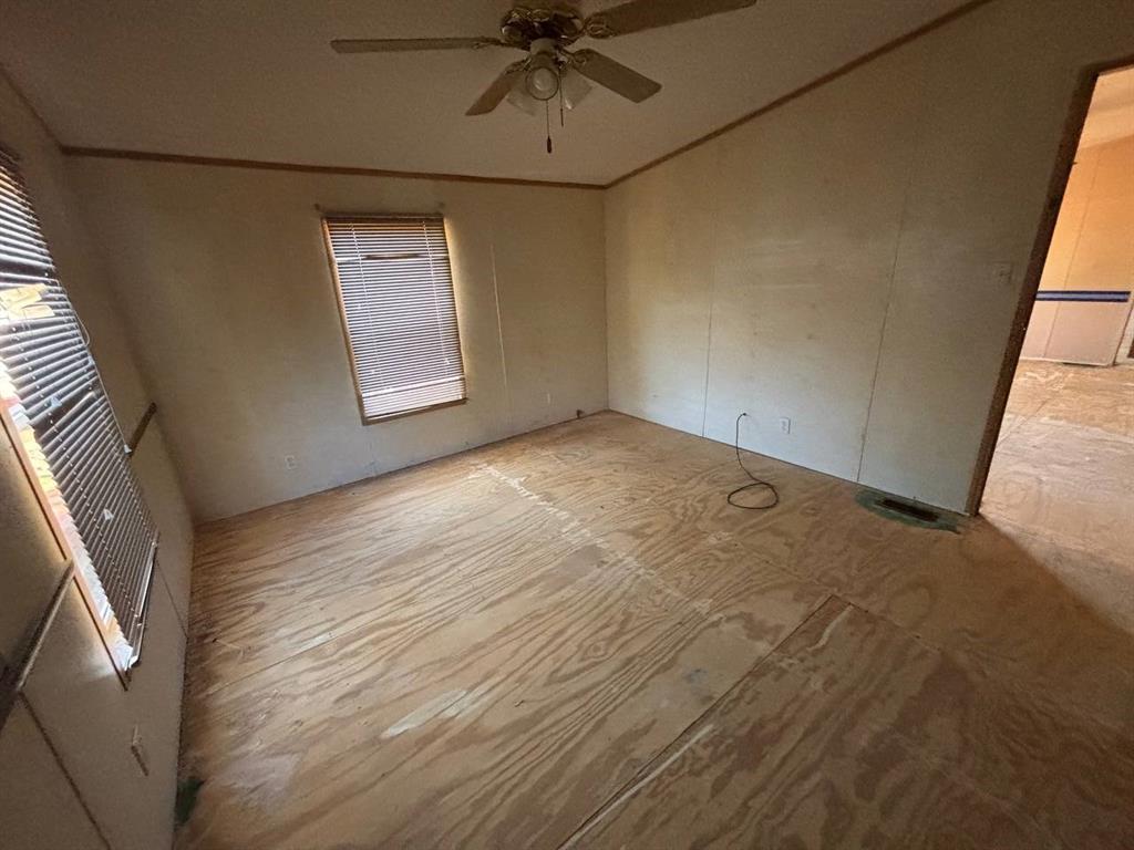 361 Cumberland Circle Murchison, TX 75778 - Photo 12 of 40 a view of an empty room and window