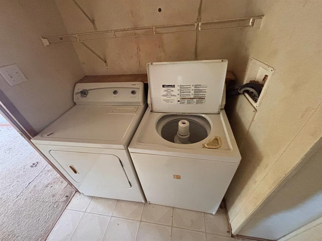 361 Cumberland Circle Murchison, TX 75778 - Photo 26 of 40 a utility room with dryer and washer