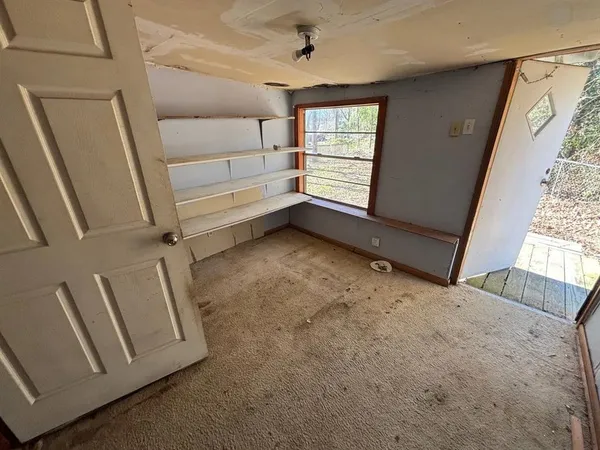 a view of a room with washing machine
