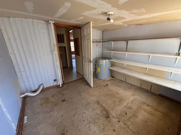 a view of a room with an empty space