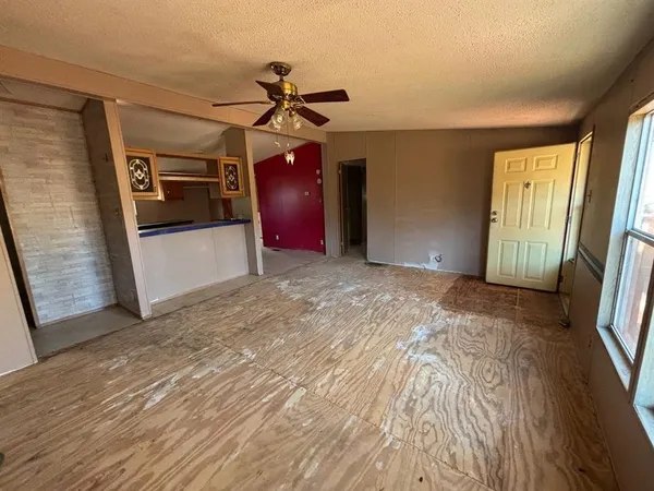 a view of a hallway with a bedroom