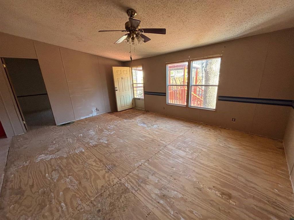 361 Cumberland Circle Murchison, TX 75778 - Photo 9 of 40 a view of an empty room with a window