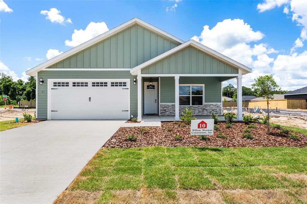 6723 Southwest 15 Place Gainesville, FL 32607 - Photo 1 of 24 a front view of a house with entertaining space